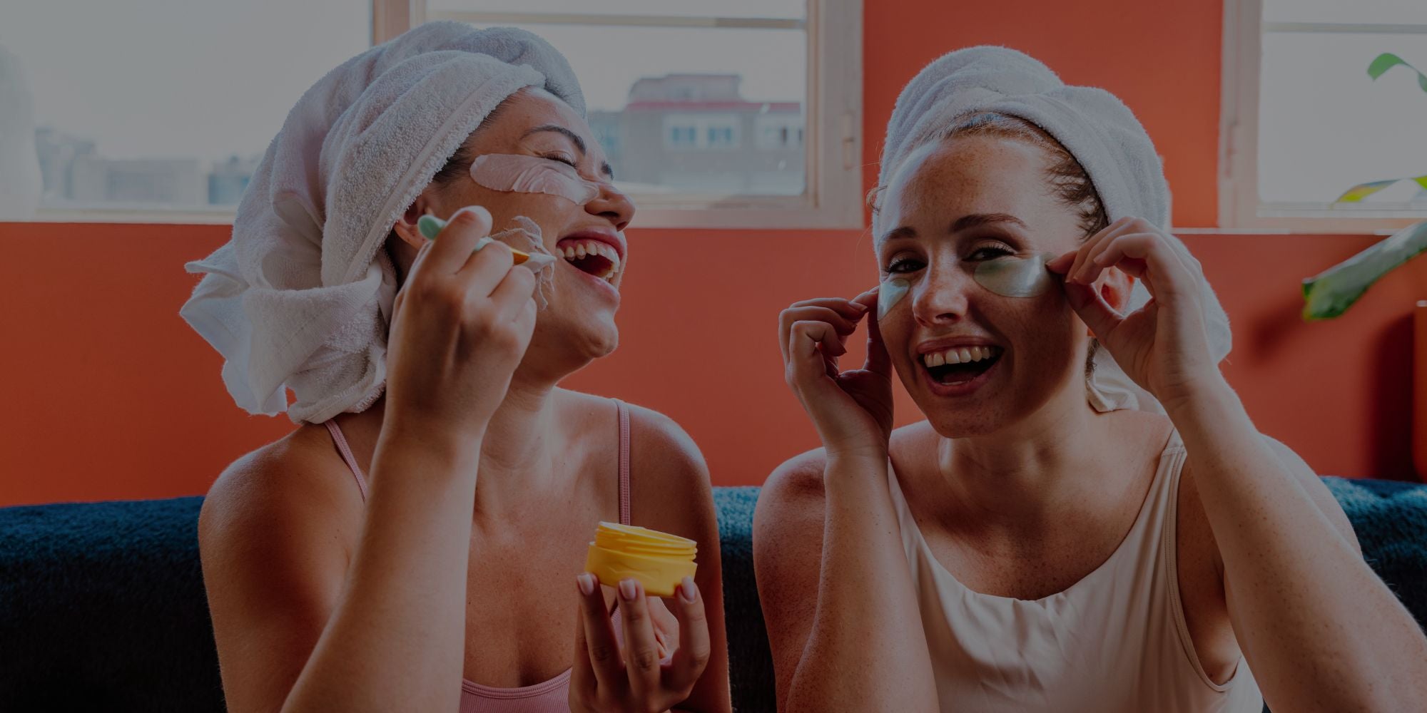 Women applying facial skincare products